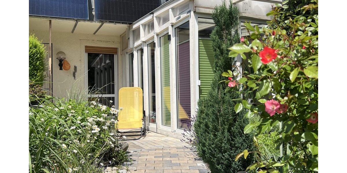 Terrasse mit Wintergarten